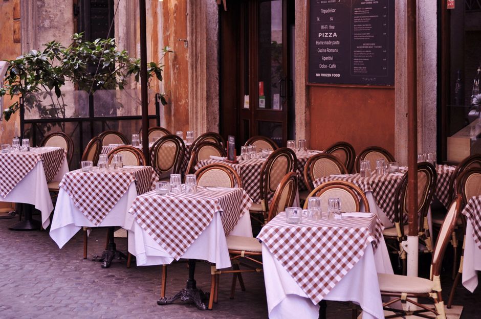 Community members gathering and socializing at a local restaurant